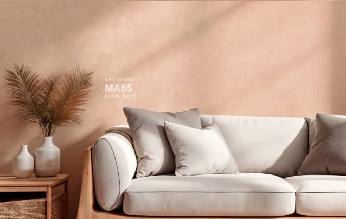 Vellplas MA65 Pink Puff wall beside a sofa