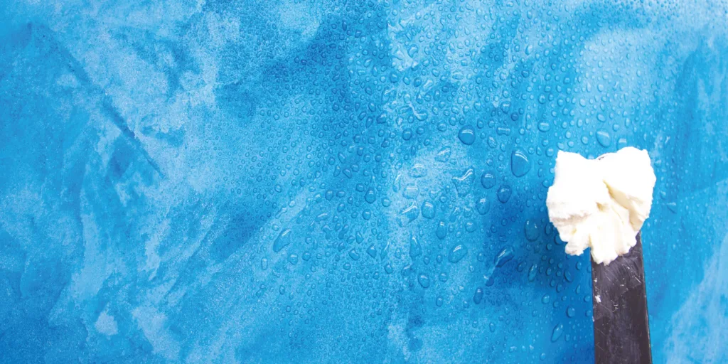 Clear Wax applied wall with water splashed.