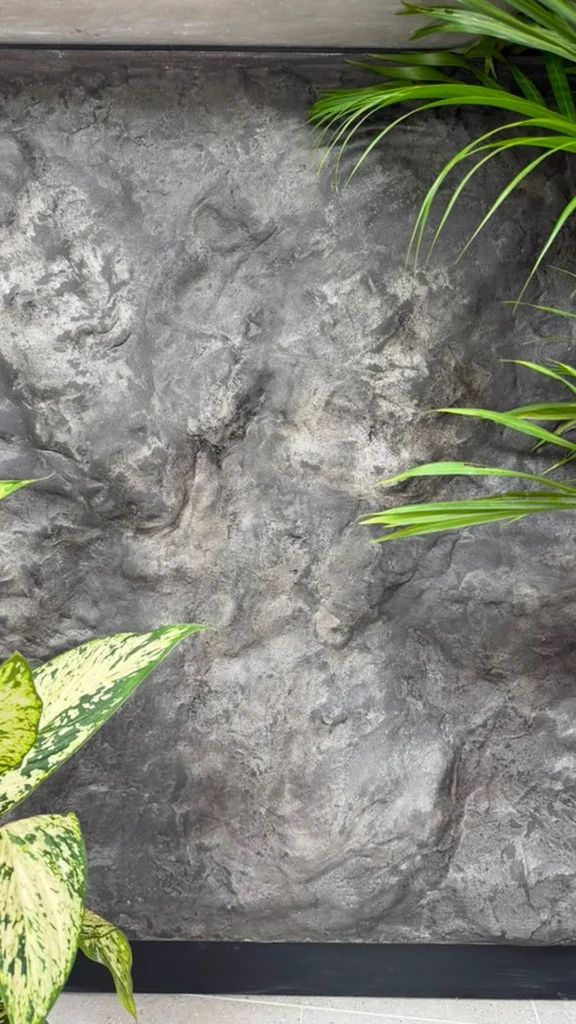 Close-up of irregular StoneArt relief and light-to-dark grey shading on the counter front.